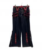 TRIPP NYCトリップニューヨークシティー）の古着「bondage pants」｜レッド×ブラック