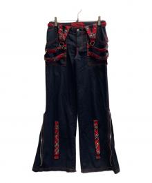 TRIPP NYC（トリップニューヨークシティー）の古着「bondage pants」｜レッド×ブラック