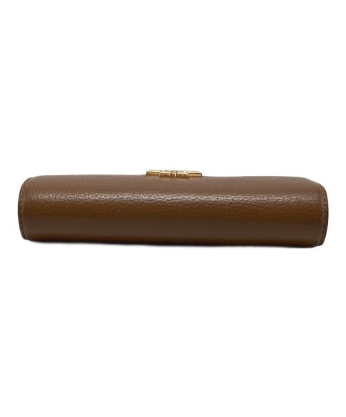 TORY BURCH（トリーバーチ）TORY BURCH (トリーバーチ) BRITTEN ENVELOPE WALLET ブラウンの古着・服飾アイテム