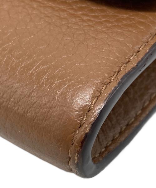 TORY BURCH（トリーバーチ）TORY BURCH (トリーバーチ) BRITTEN ENVELOPE WALLET ブラウンの古着・服飾アイテム