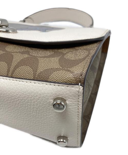 COACH（コーチ）COACH (コーチ) DISNEY (ディズニー) ダンボシグネチャーミックスティリーショルダーバッグ / 91120 ベージュの古着・服飾アイテム
