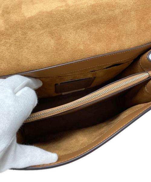 COACH（コーチ）COACH (コーチ) DISNEY (ディズニー) ダンボシグネチャーミックスティリーショルダーバッグ / 91120 ベージュの古着・服飾アイテム