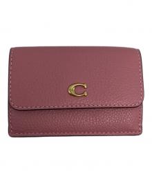 COACH（コーチ）の古着「ミニトライフォールドウォレット」｜ピンク
