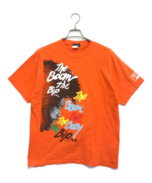 バンドTシャツ（バンドTシャツ）バンドTシャツ (バンドTシャツ) 00s ROOTS(ルーツ) バンドTシャツ オレンジ サイズ:Ｌの古着・服飾アイテム