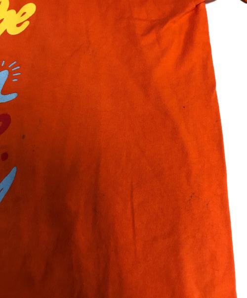 バンドTシャツ（バンドTシャツ）バンドTシャツ (バンドTシャツ) 00s ROOTS(ルーツ) バンドTシャツ オレンジ サイズ:Ｌの古着・服飾アイテム