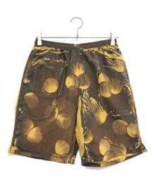 GOODENOUGH（グッドイナフ）の古着「貝殻プリントハーフパンツ」｜カーキ