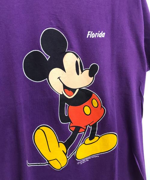 キャラクターTシャツ（キャラクターTシャツ）キャラクターTシャツ (キャラクターTシャツ) MICKEY MOUSE(ミッキーマウス) キャラクターTシャツ パープル サイズ:Ｌの古着・服飾アイテム