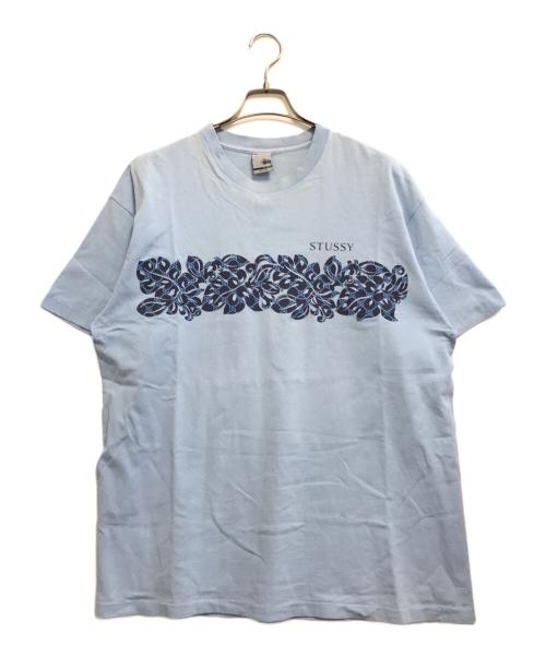 stussy（ステューシー）stussy (ステューシー) プリントTシャツ スカイブルー サイズ:XLの古着・服飾アイテム