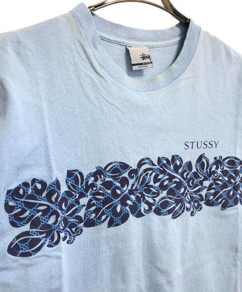 stussy（ステューシー）stussy (ステューシー) プリントTシャツ スカイブルー サイズ:XLの古着・服飾アイテム