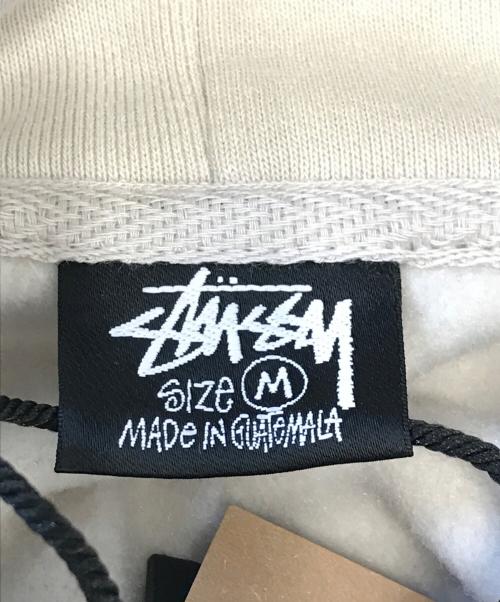 stussy（ステューシー）stussy (ステューシー) プルオーバーパーカー アイボリー サイズ:M 未使用品の古着・服飾アイテム