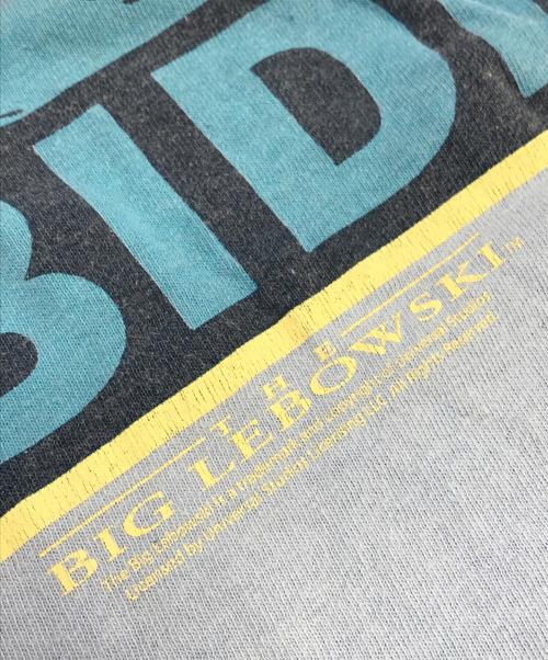 ムービーTシャツ（ムービーTシャツ）ムービーTシャツ (ムービーTシャツ) 00s The Big Lebowski(ザ・ビッグ・リボウスキ) ムービーTシャツ スカイブルー サイズ:2XLの古着・服飾アイテム