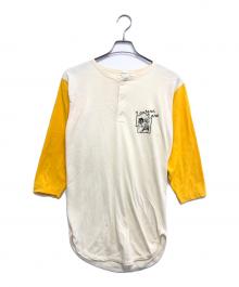 Champion（チャンピオン）の古着「染込みプリントヘンリーネックカットソー」｜イエロー