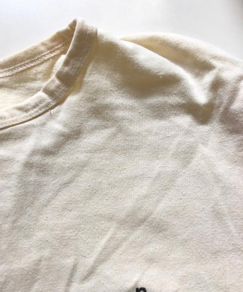 Champion（チャンピオン）Champion (チャンピオン) 染込みプリントヘンリーネックカットソー イエロー サイズ:Lの古着・服飾アイテム