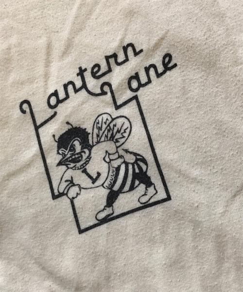 Champion（チャンピオン）Champion (チャンピオン) 染込みプリントヘンリーネックカットソー イエロー サイズ:Lの古着・服飾アイテム