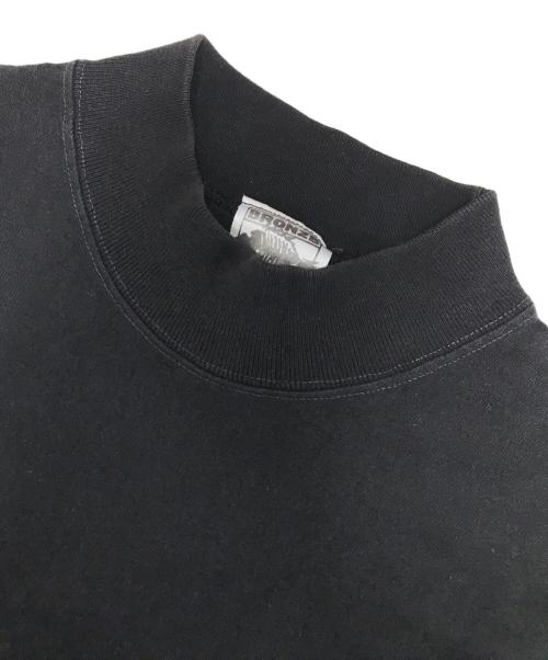 BRONZE AGE（ブロンズエイジ）BRONZE AGE (ブロンズエイジ) 両面プリントモックネック長袖Tシャツ ブラック サイズ:MEDIUMの古着・服飾アイテム