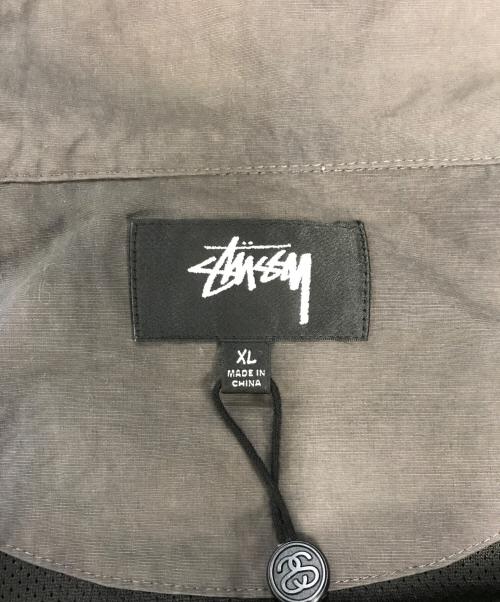 stussy（ステューシー）stussy (ステューシー) BEACH SHELL WAVE DYE グレー サイズ:XLの古着・服飾アイテム