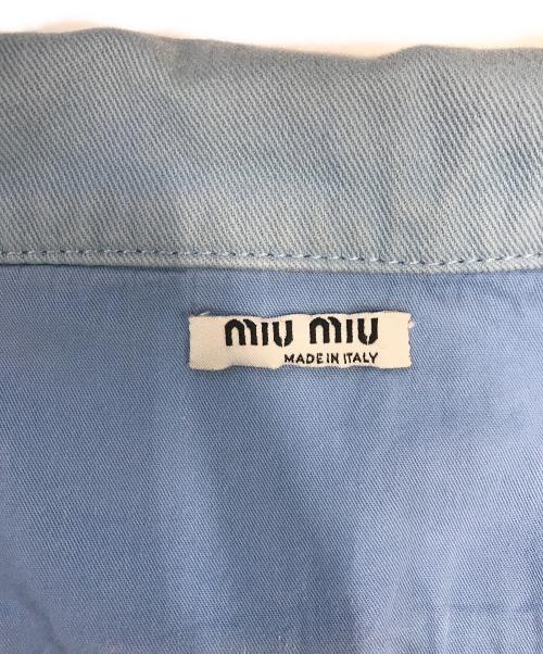 MIU MIU（ミュウミュウ）MIU MIU (ミュウミュウ) フリルデザインジップジャケット スカイブルー サイズ:44の古着・服飾アイテム