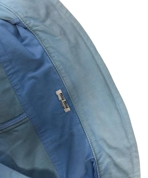 MIU MIU（ミュウミュウ）MIU MIU (ミュウミュウ) フリルデザインジップジャケット スカイブルー サイズ:44の古着・服飾アイテム