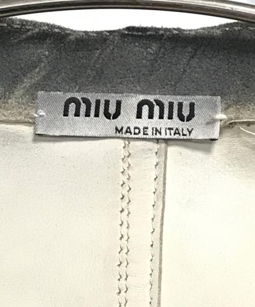MIU MIU（ミュウミュウ）MIU MIU (ミュウミュウ) ジップデザインノーカラーレザージャケット グレー サイズ:38の古着・服飾アイテム