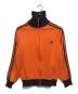 adidas（アディダス）の古着「トラックジャケット」｜オレンジ
