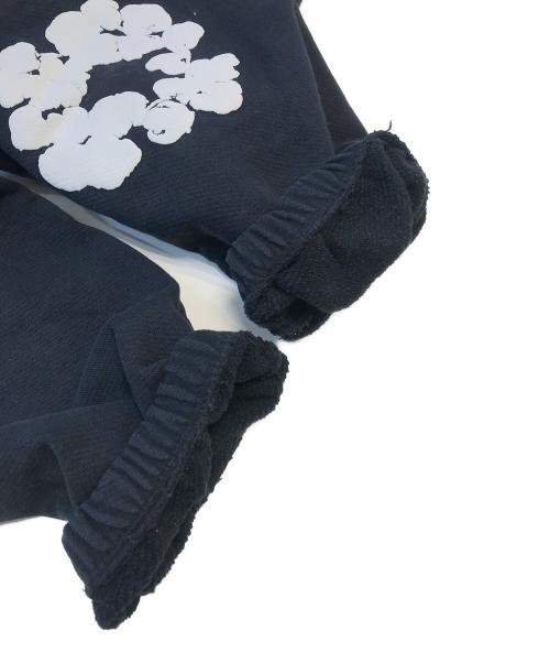 Denim Tears（デニムティアーズ）Denim Tears (デニムティアーズ) Cotton Wreath-print track pants ブラック サイズ:Ｓの古着・服飾アイテム