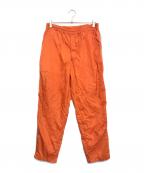 COMME des GARCONS SHIRTコムデギャルソンシャツ）の古着「ナイロンパンツ」｜オレンジ