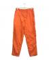 COMME des GARCONS SHIRT（コムデギャルソンシャツ）の古着「ナイロンパンツ」｜オレンジ