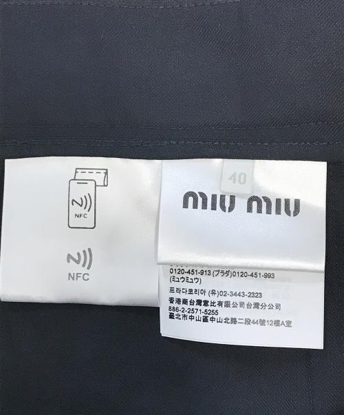 MIU MIU（ミュウミュウ）MIU MIU (ミュウミュウ) コードラッププリーツスカート ネイビー サイズ:40の古着・服飾アイテム