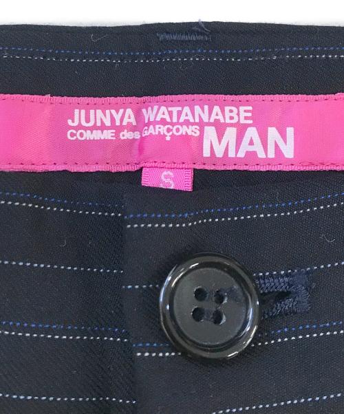 JUNYA WATANABE MAN PINK（ジュンヤワタナベマン ピンク）JUNYA WATANABE MAN PINK (ジュンヤワタナベマン ピンク) ストライプフレアパンツ ネイビー サイズ:Ｓ 未使用品の古着・服飾アイテム