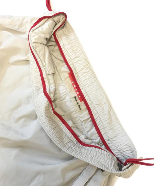 PRADA SPORTS（プラダスポーツ）PRADA SPORTS (プラダスポーツ) ジップパンツ アイボリー サイズ:SIZE40の古着・服飾アイテム
