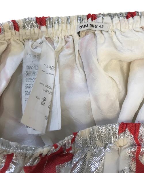 MIU MIU（ミュウミュウ）MIU MIU (ミュウミュウ) スター柄 ミニスカート ベージュ サイズ:42の古着・服飾アイテム