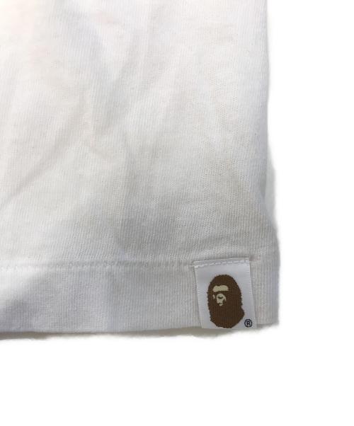 SAINT MICHAEL（セントマイケル）SAINT MICHAEL (セントマイケル) A BATHING APE (アベイシングエイプ) HANDPRINT BAPE SS TEE ピンク×ホワイト サイズ:2XLの古着・服飾アイテム