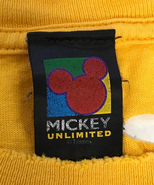 キャラクターTシャツ（キャラクターTシャツ）キャラクターTシャツ (キャラクターTシャツ) MICKEY UNLIMITED(ミッキーアンリミテッド)プリントTシャツ イエロー サイズ:表記なしの古着・服飾アイテム
