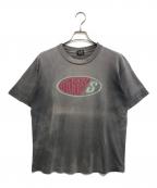 stussyステューシー）の古着「オーバルロゴプリントTシャツ」｜ブラック