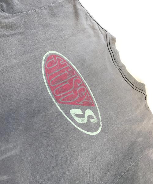 stussy（ステューシー）stussy (ステューシー) オーバルロゴプリントTシャツ ブラック サイズ:Lの古着・服飾アイテム