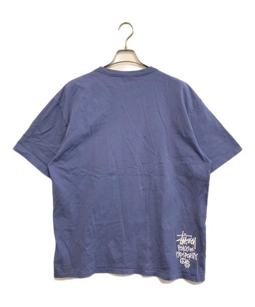 stussy（ステューシー）stussy (ステューシー) PEACE PROSPERITY Tee ネイビー サイズ:XLの古着・服飾アイテム
