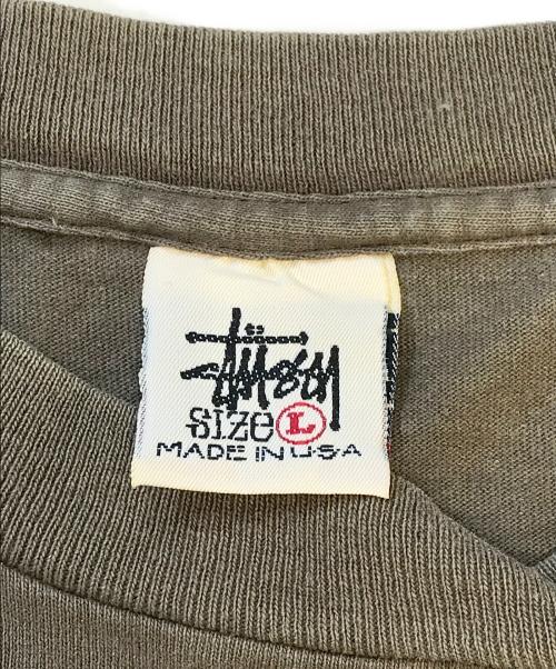 stussy（ステューシー）stussy (ステューシー) 折れクラウンSロゴプリントTシャツ カーキ サイズ:Lの古着・服飾アイテム