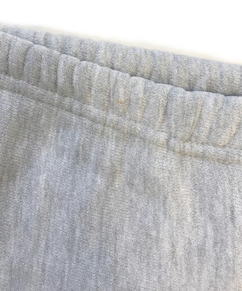 Champion（チャンピオン）Champion (チャンピオン) 染込みプリント リバースウィーブパンツ グレー サイズ:LARGEの古着・服飾アイテム