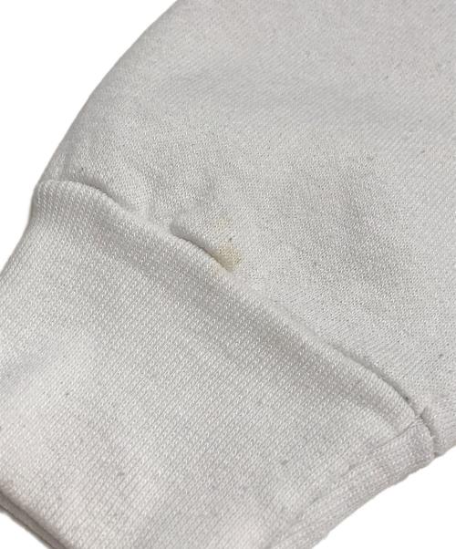 Champion（チャンピオン）Champion (チャンピオン) 染込みプリントラグランスウェット ホワイト サイズ:Lの古着・服飾アイテム