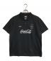 F.C.R.B.（エフシーレアルブリストル）の古着「Coca-Cola WEAVE STRIPE S/S POLO」｜ブラック