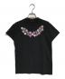 tricot COMME des GARCONS（トリココムデギャルソン）の古着「花柄装飾Tシャツ」｜ブラック