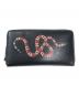 GUCCI（グッチ）の古着「スネークラウンドジップウォレット」｜ブラック