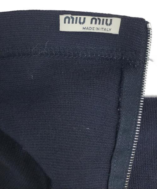 MIU MIU（ミュウミュウ）MIU MIU (ミュウミュウ) ドルマンスリーブジップニット ネイビー サイズ:40の古着・服飾アイテム