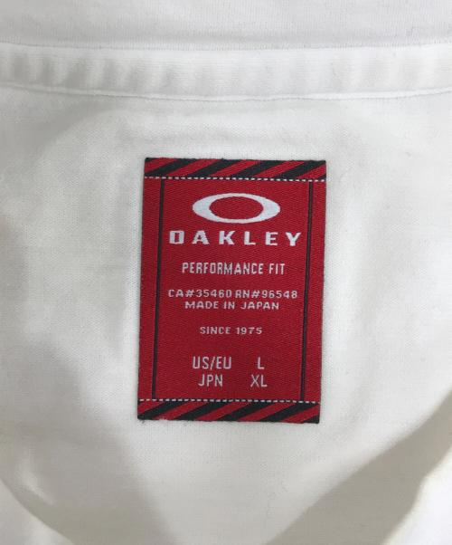 OAKLEY（オークリー）OAKLEY (オークリー) プリントTシャツ ホワイト サイズ:XLの古着・服飾アイテム
