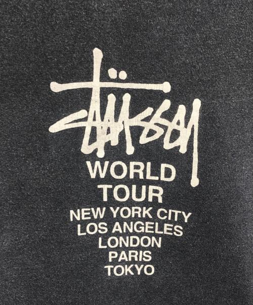 stussy（ステューシー）stussy (ステューシー) ワールドツアーTシャツ ネイビー サイズ:XLの古着・服飾アイテム
