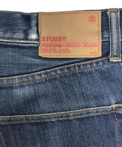 stussy（ステューシー）stussy (ステューシー) SSシャネルロゴデニムパンツ インディゴ サイズ:32の古着・服飾アイテム