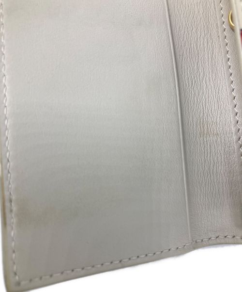 Saint Laurent Paris（サンローランパリ）Saint Laurent Paris (サンローランパリ) キーケース アイボリー×レッドの古着・服飾アイテム