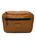 TUMIトゥミ）の古着「レザートラベルポーチ」｜ブラウン