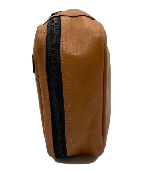 TUMI（トゥミ）TUMI (トゥミ) レザートラベルポーチ ブラウンの古着・服飾アイテム
