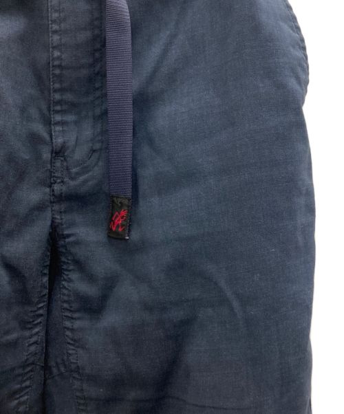 WHITE MOUNTAINEERING（ホワイトマウンテ二アニング）WHITE MOUNTAINEERING (ホワイトマウンテ二アニング) GRAMICCI (グラミチ) クライミングカーゴパンツ ネイビーの古着・服飾アイテム